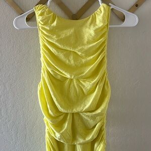 Beautiful yellow dress with low back by Alice + Olivia!